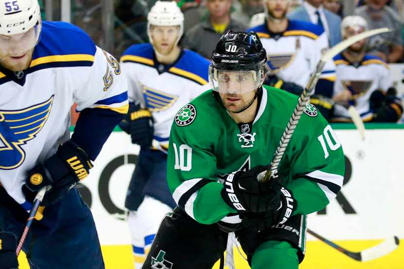 Dallas Stars left wing Patrick Sharp (10) chases down St. Louis Blues defenseman Colton...