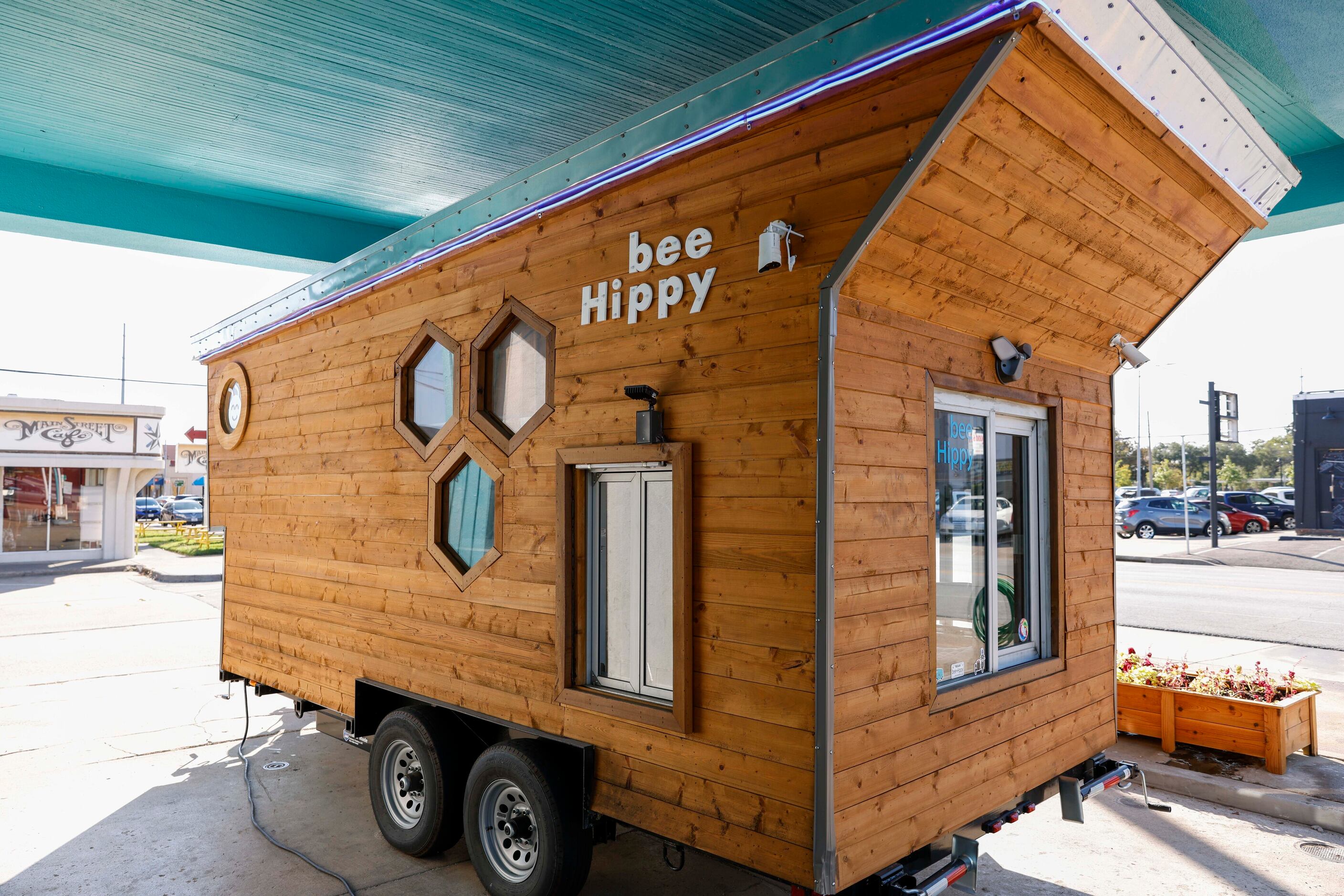 Outside the Bee Hippy showroom is a trailer that owner Chris Fagan said he takes to local...