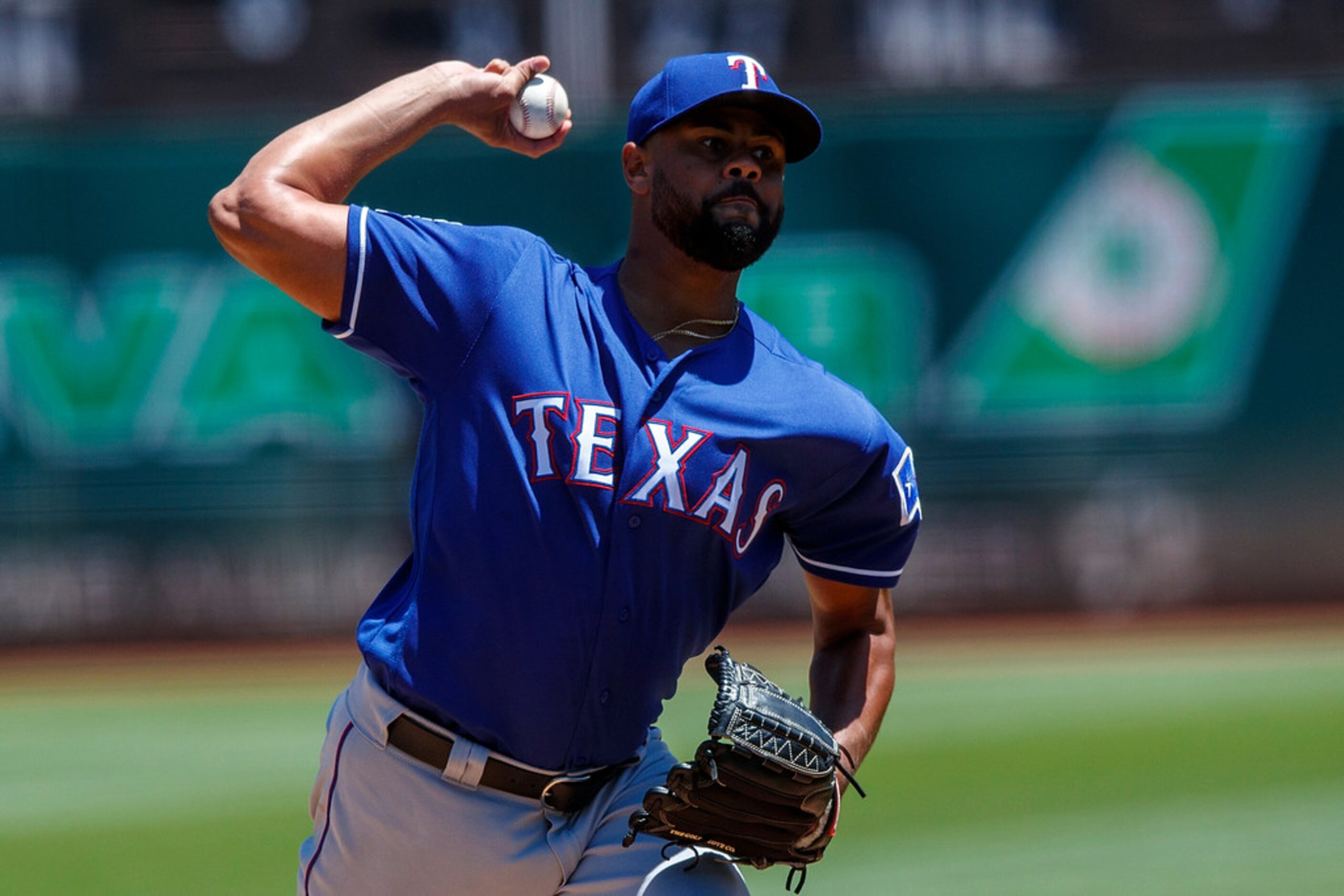 OAKLAND, CA - JULY 28:  Pedro Payano #51 of the Texas Rangers pitches against the Oakland...