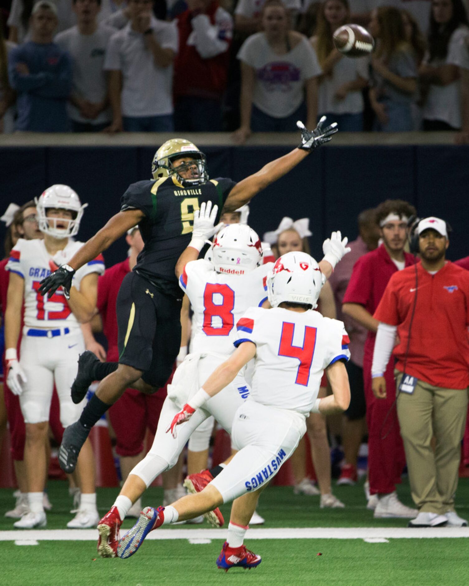 Birdville running back Laderrious Mixon (9) misses a pass during a high school football game...