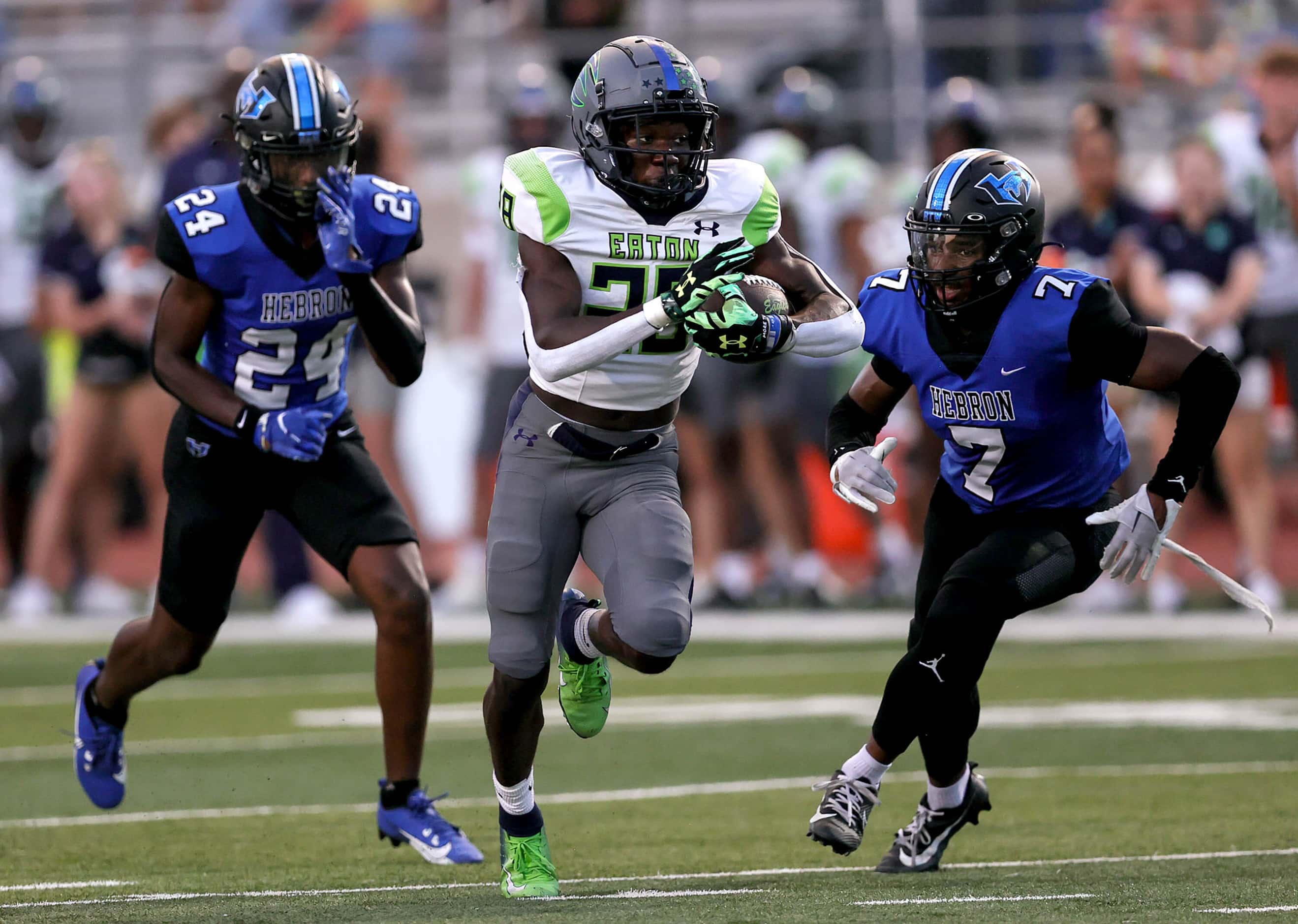 Eaton running back Demarion Williams (28) goes 27 yards for a touchdown against Hebron...
