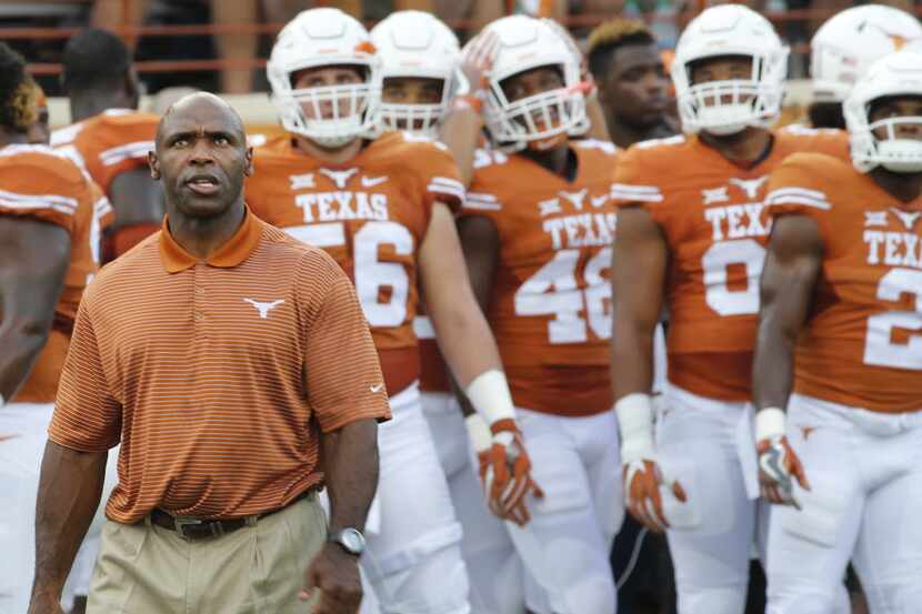 Texas head coach Charlie Strong is pictured during warmups before the Notre Dame Fighting...