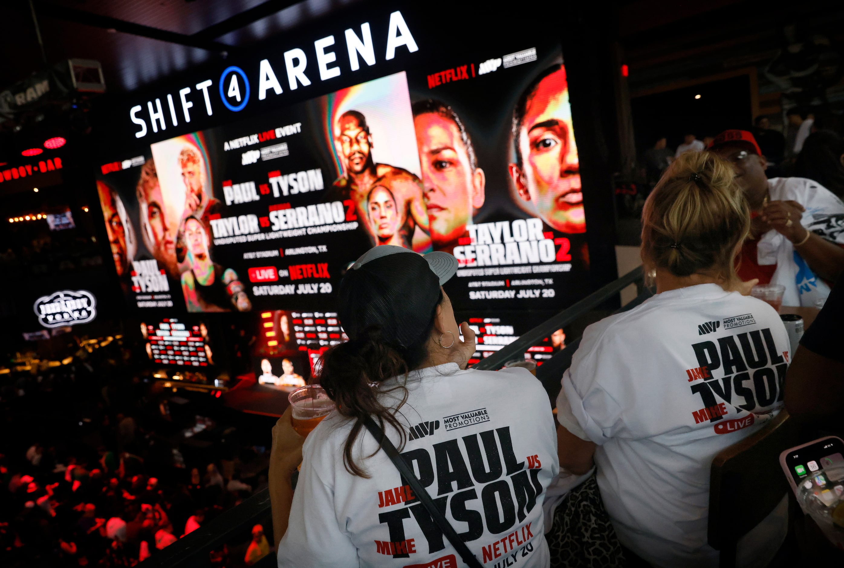 Ahead of the July fight at AT&T Stadium, fans wait to see boxers Mike Tyson and Jake Paul...