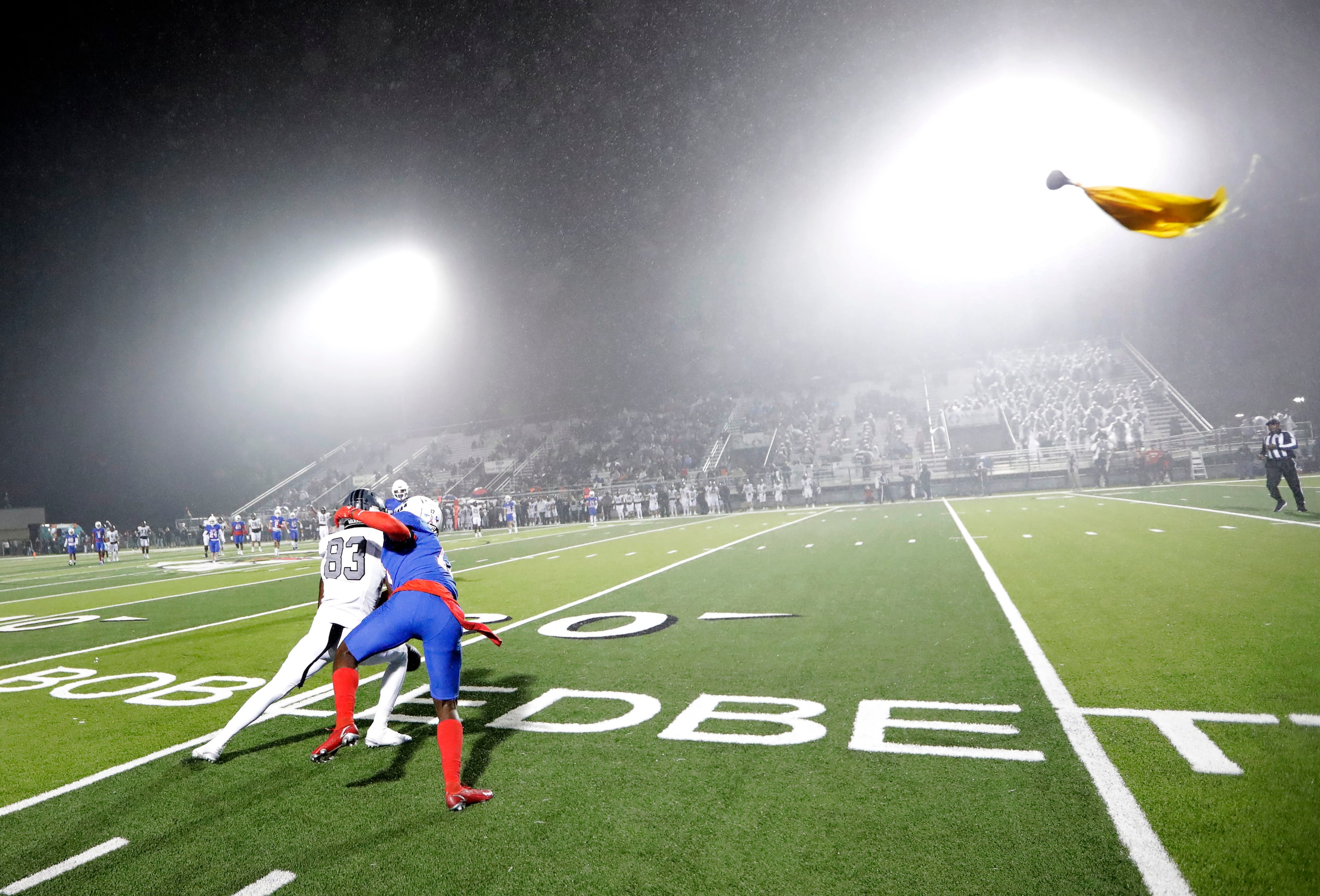 A pass interference flag comes flying in on Allen defensive back Kai Wheaton (17) as...