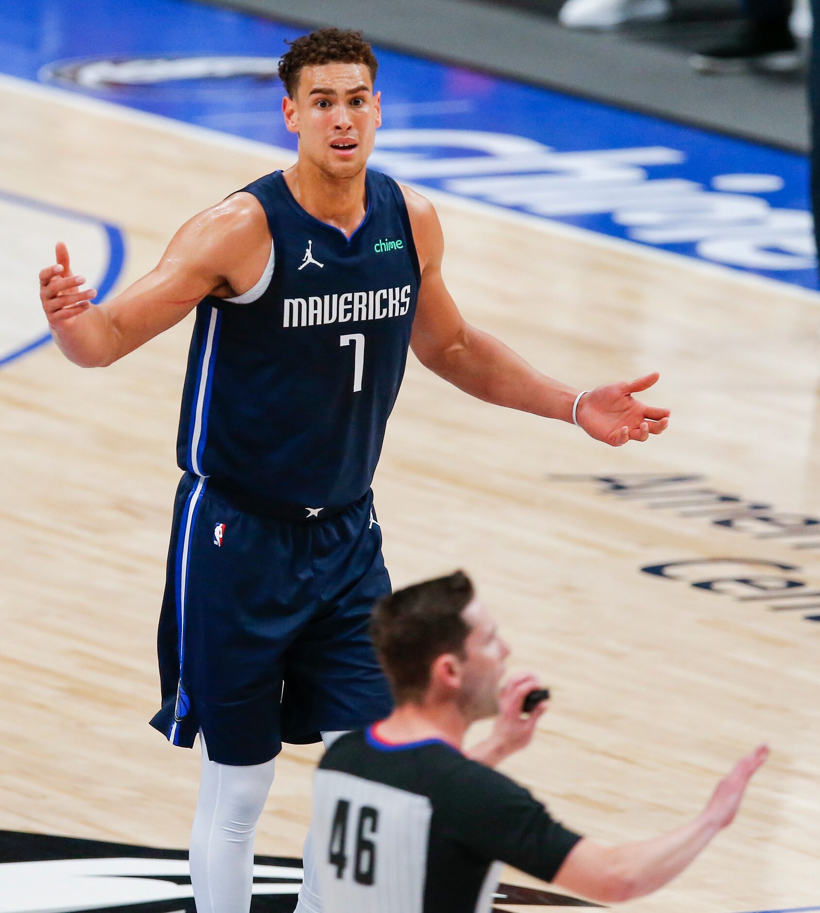 Dallas Mavericks forward Dwight Powell (7) reacts to a no basket shot clock violation during...