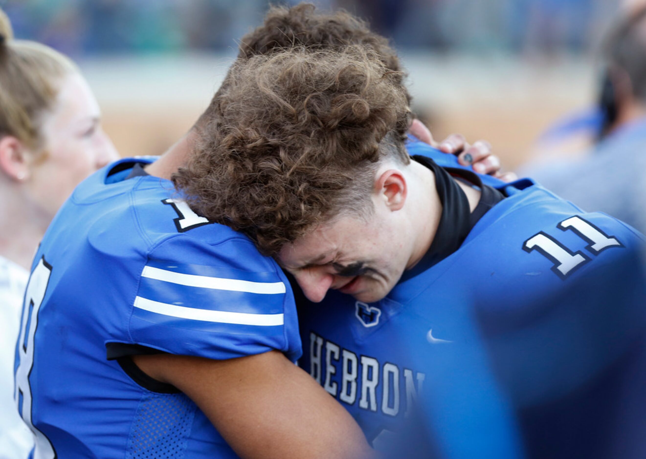 Hebron High School wide receiver Donovan Tubbs (18) and Hebron High School outside...