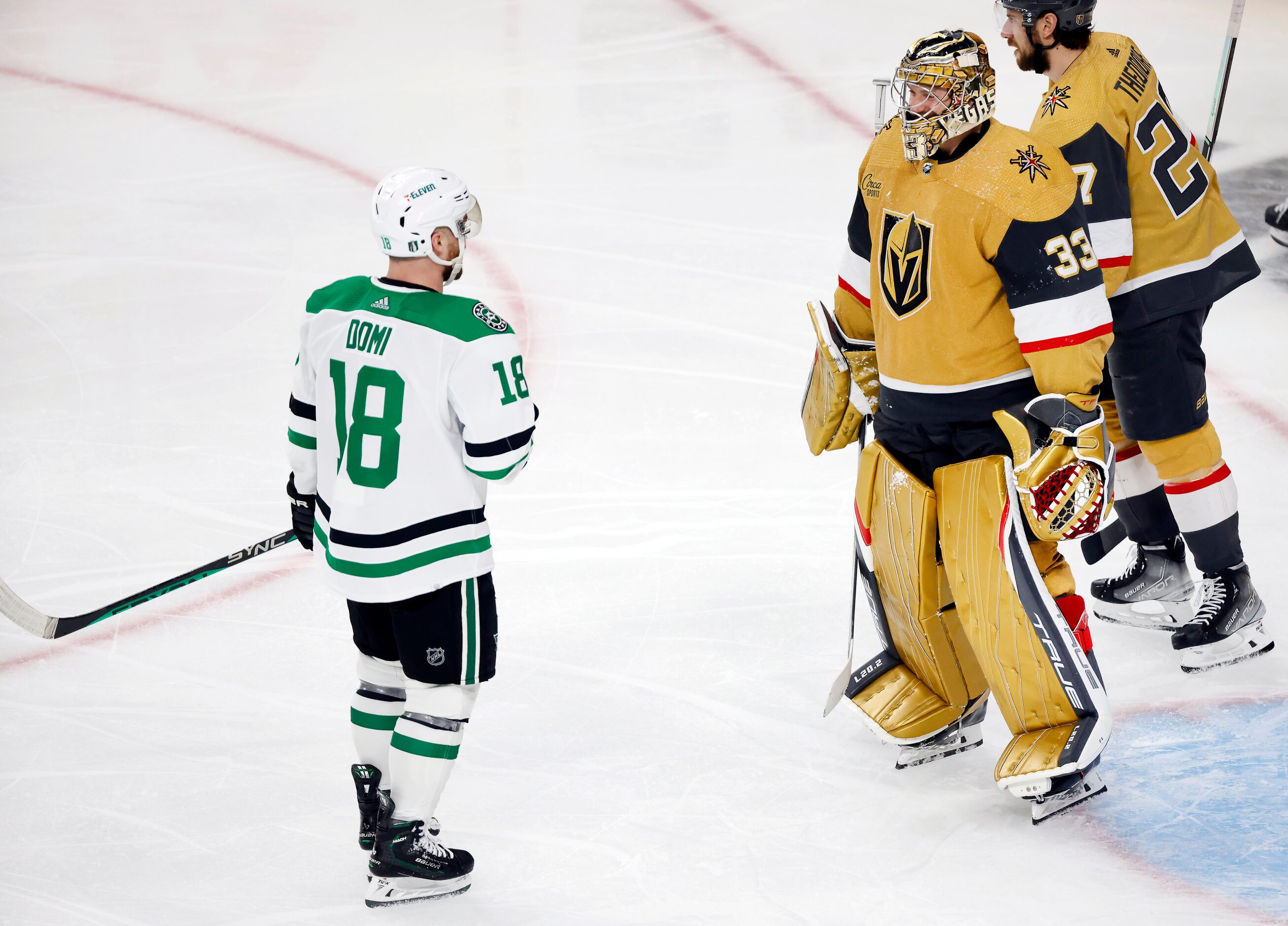 Vegas Golden Knights goaltender Adin Hill (33) has a few words for Dallas Stars center Max...