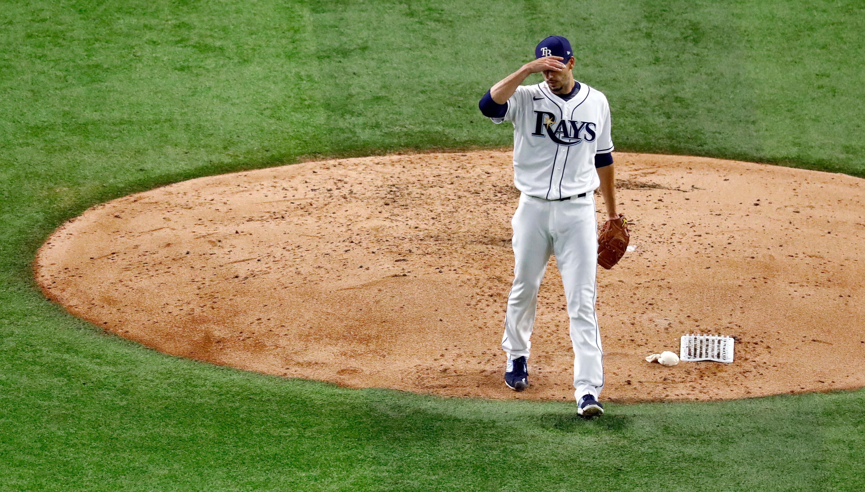 Tampa Bay Rays starting pitcher Charlie Morton (50) walks off the mound after giving up an...