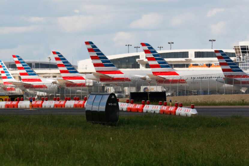 American Airlines airplanes parked at DFW International Airport on Wednesday, August 23,...