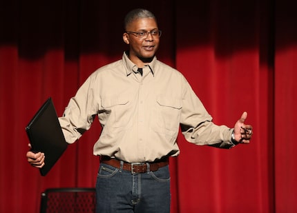 SMU Professor Benard Cummings speaks to the crowd before announcing the winners.