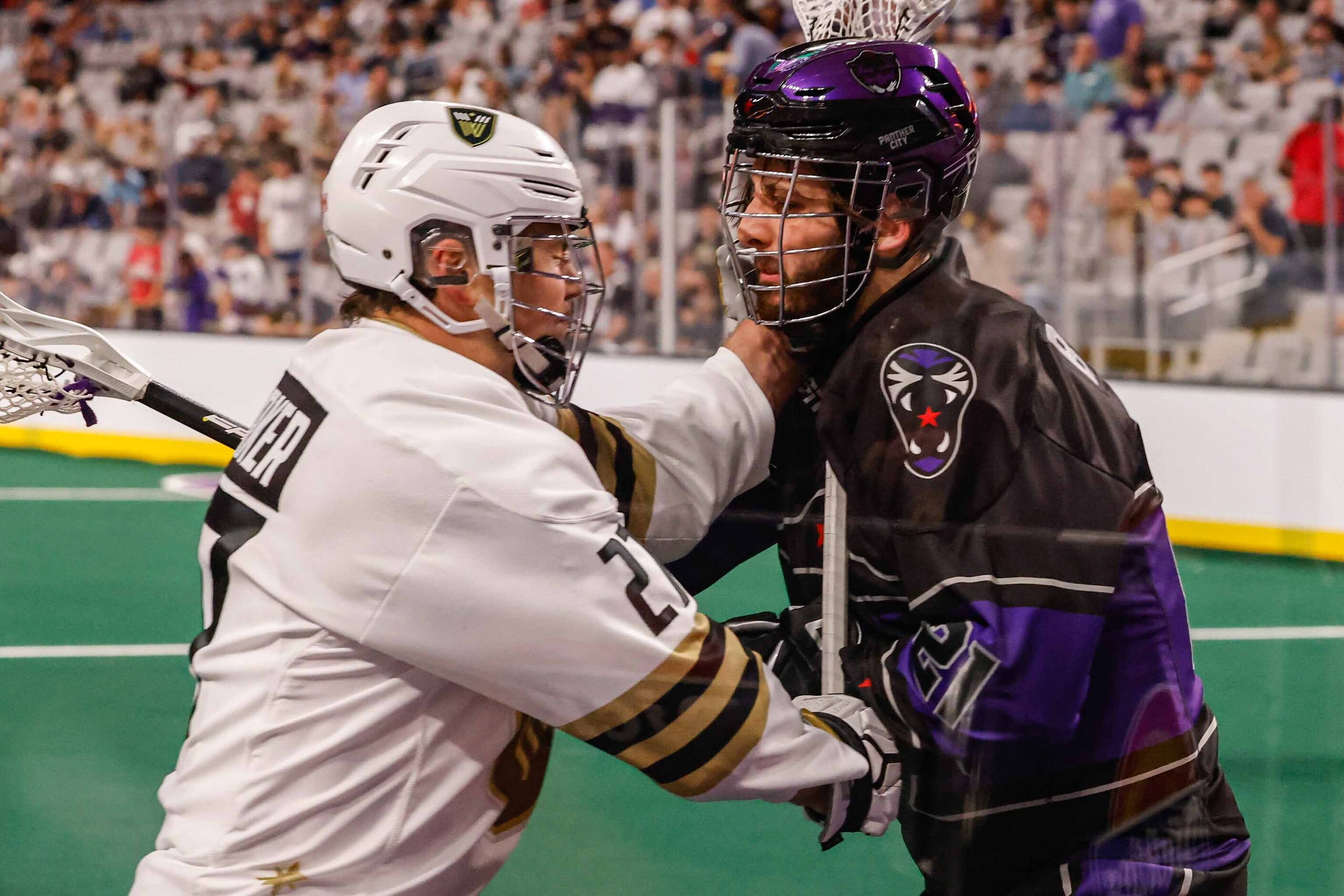 Panther City Liam Byrnes (21) and Vancouver Warriors Owen Barker (27) play to recover the...