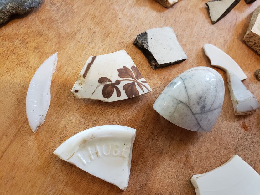 While excavating their yard for the family garden, the Marshes found pieces of pottery,...