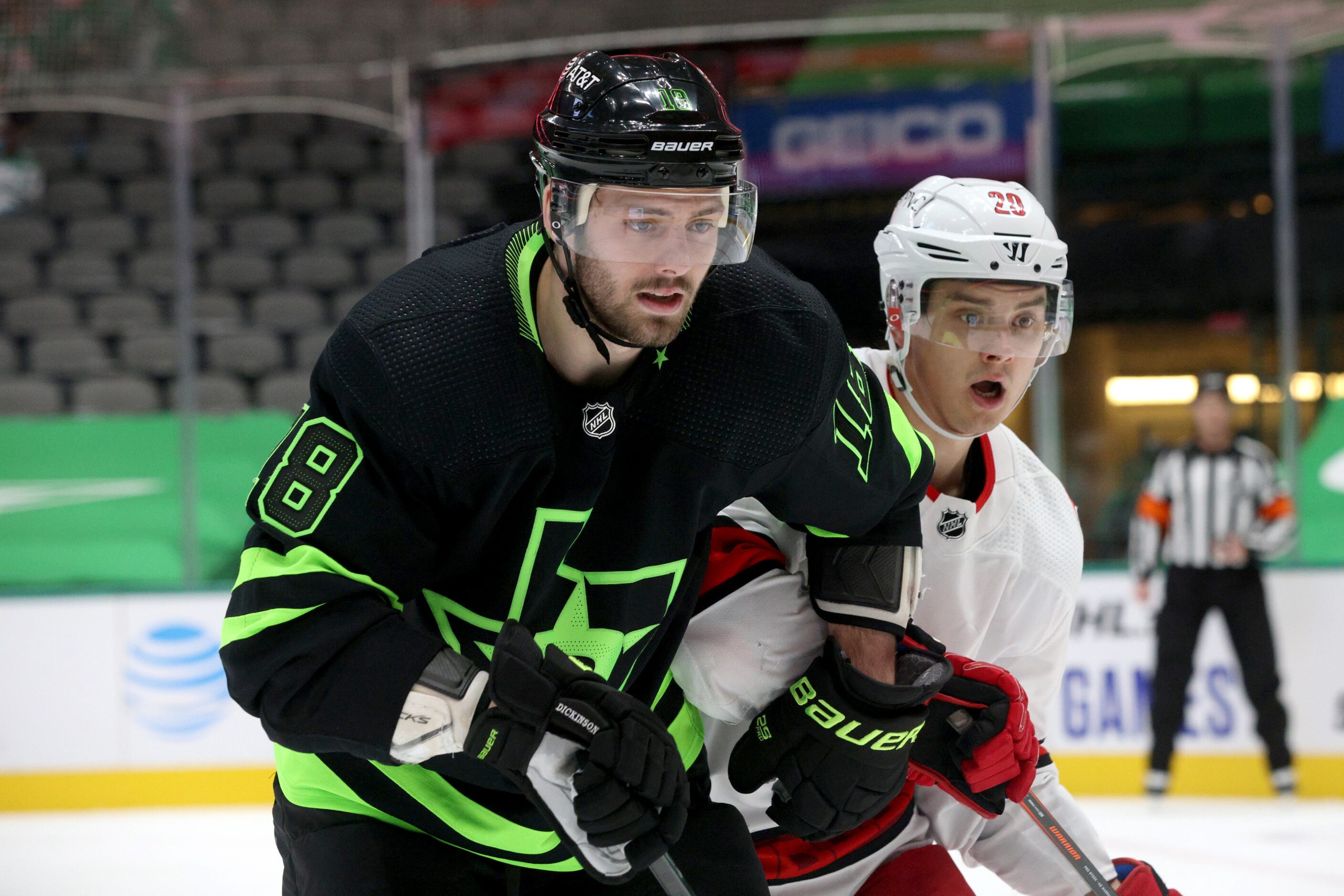 Dallas Stars center Jason Dickinson (18) defends against Carolina Hurricanes right wing...