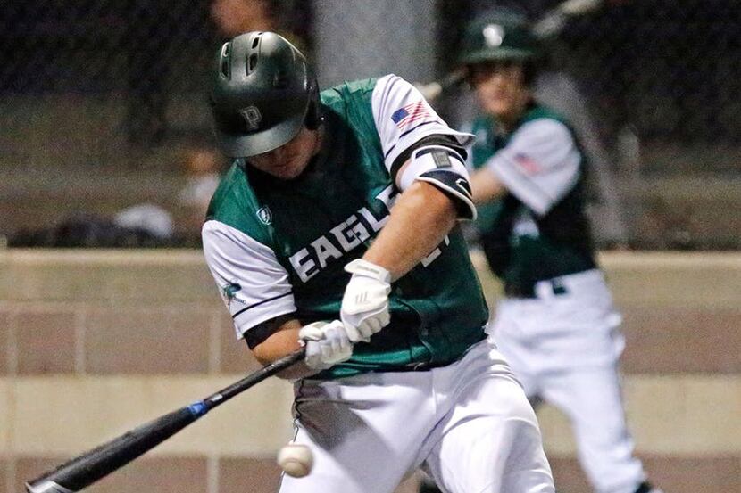 Prosper designated hitter Adam Sheriff (27) makes contact in the fourth inning as Jesuit...