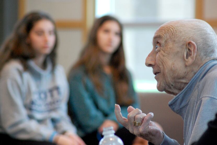 Max Glauben speaks with high school seniors at Akiba Yavneh Academy April 12.  Photo...
