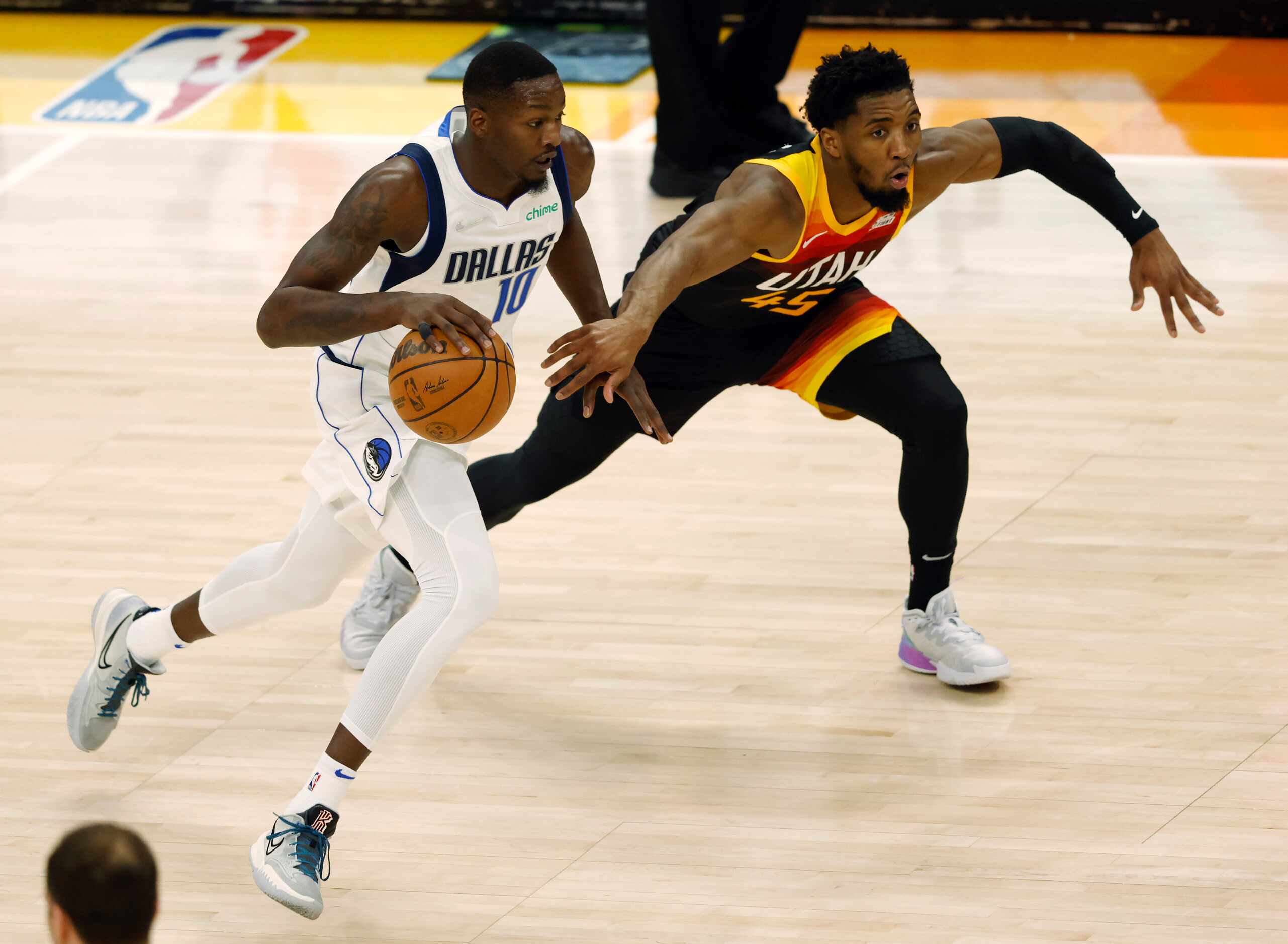 Dallas Mavericks forward Dorian Finney-Smith (10) drives past Utah Jazz guard Donovan...