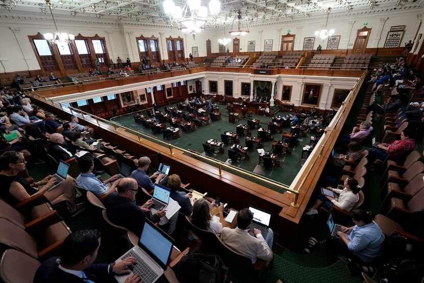 Texas state senators acting as jurors vote on the articles of impeachment against suspended...