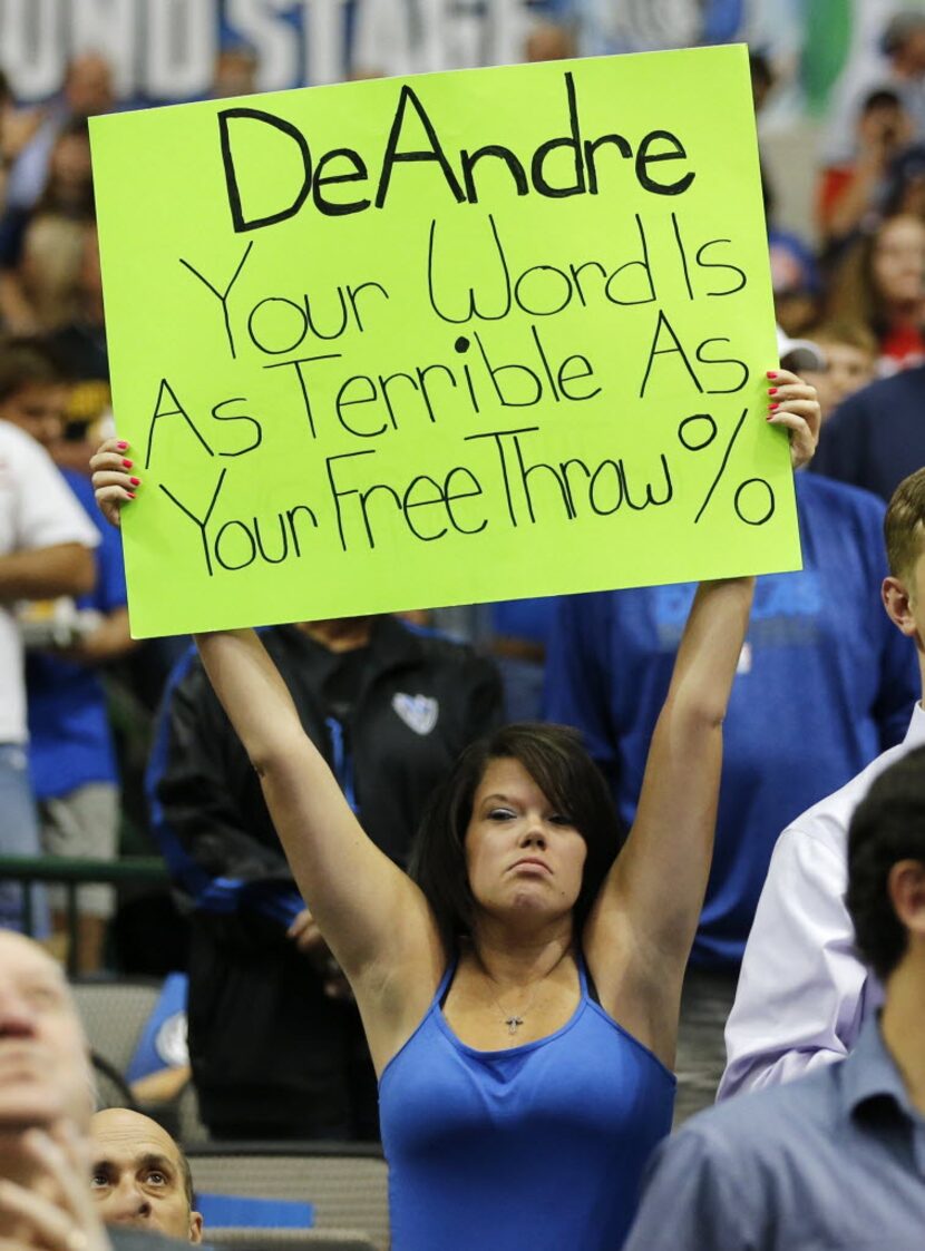 Dallas Mavericks fan holds up a Los Angeles Clippers center DeAndre Jordan (6) sign before a...