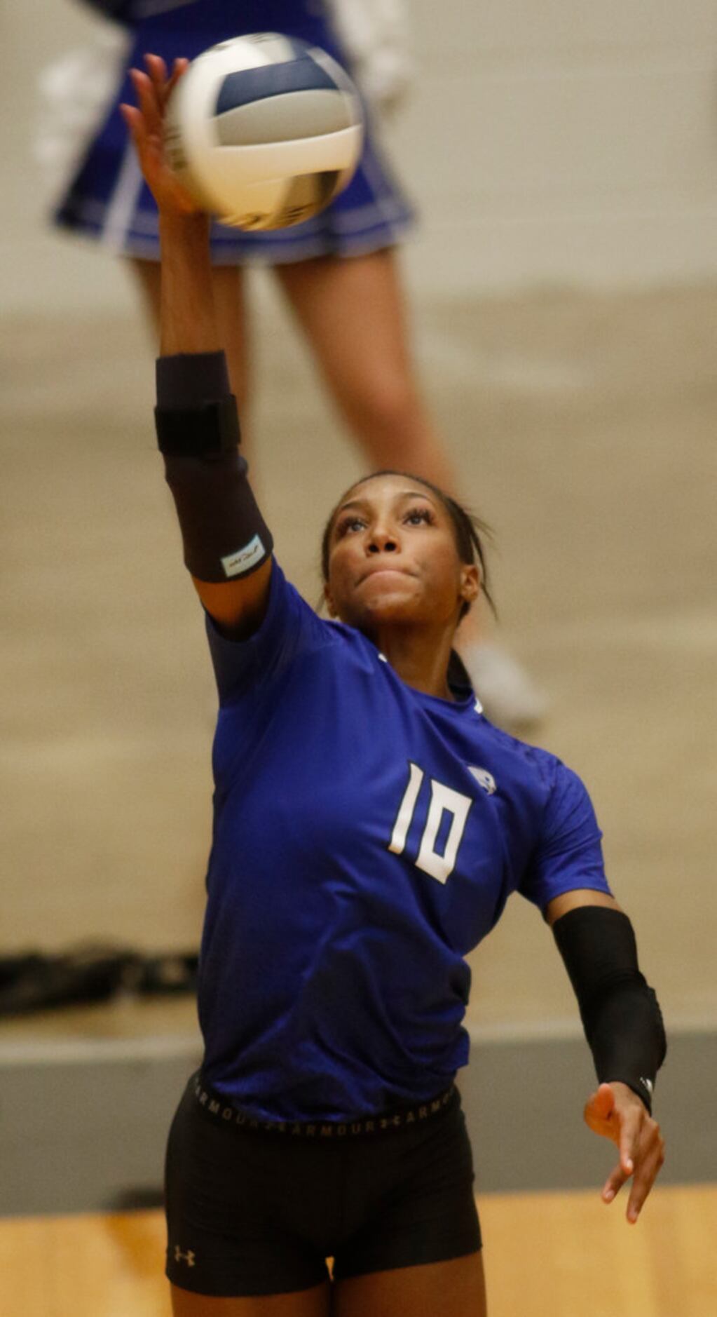 Trophy Club Byron Nelson outside hitter Charitie Luper (10) serves during the 2nd game of...