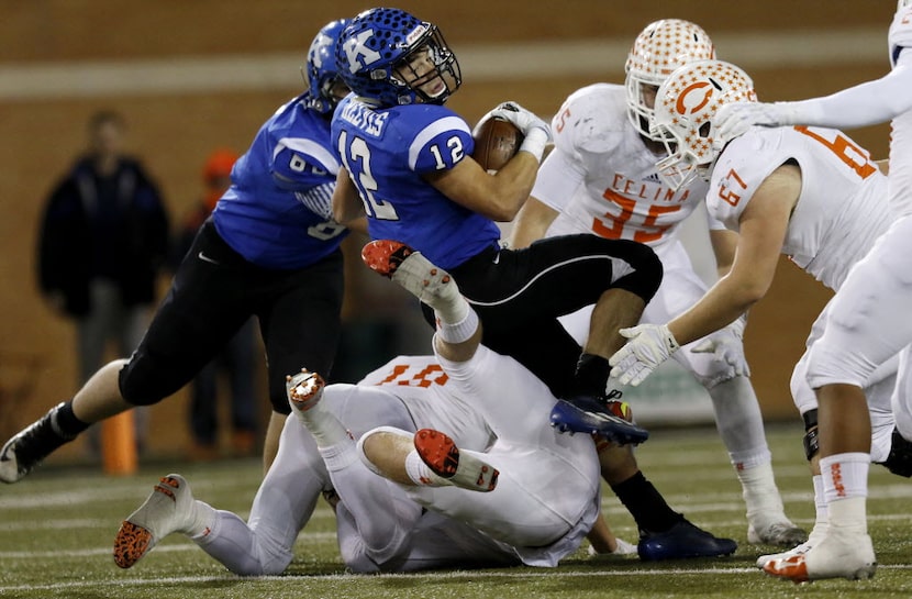 Krum's Brandon Reeves prepares to be tackled in the 3rd quarter as Celina faces Krum in the...