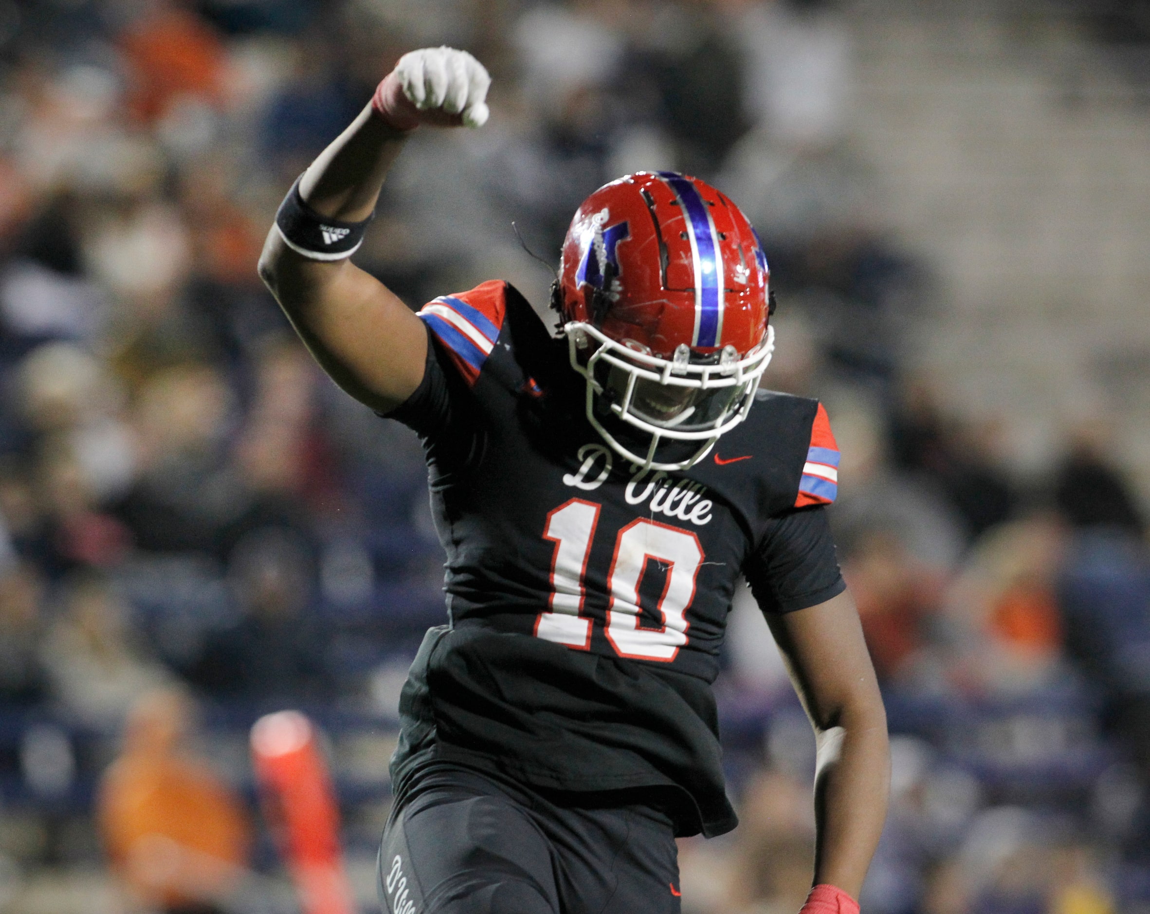 Duncanville defensive end KJ Ford (10) celebrates a quarterback sack during second quarter...