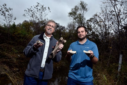 Roger Duval (left) and Brandon Burks, environmental analysts with DFW International Airport,...