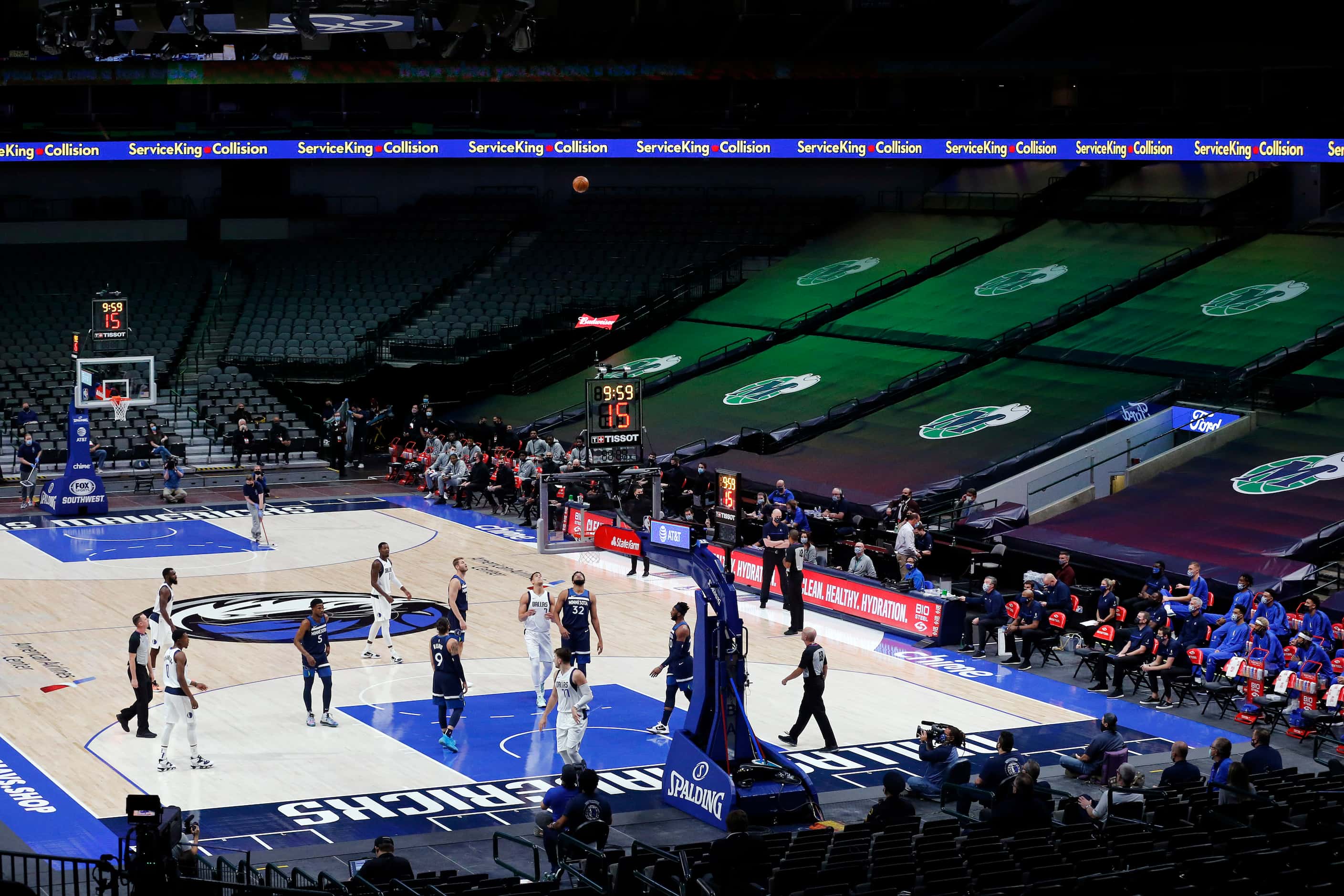 Before the empty stands of the American Airlines Center, a Dallas Mavericks player threw the...
