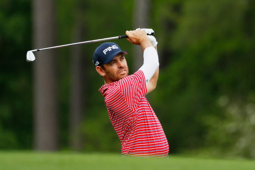 AUGUSTA, GEORGIA - APRIL 12: Louis Oosthuizen of South Africa plays a shot on the 12th hole...
