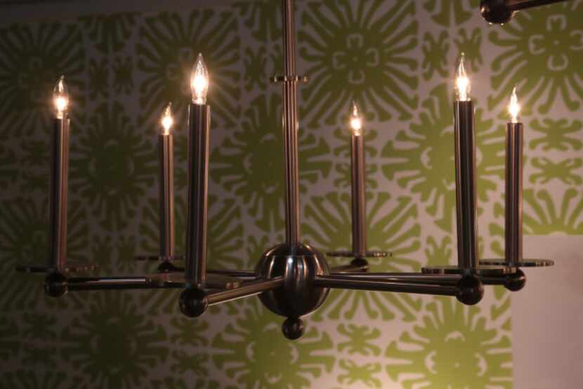 A chrome chandelier chosen by Lisa Luby Ryan falls into the trendy vintage-modern category.