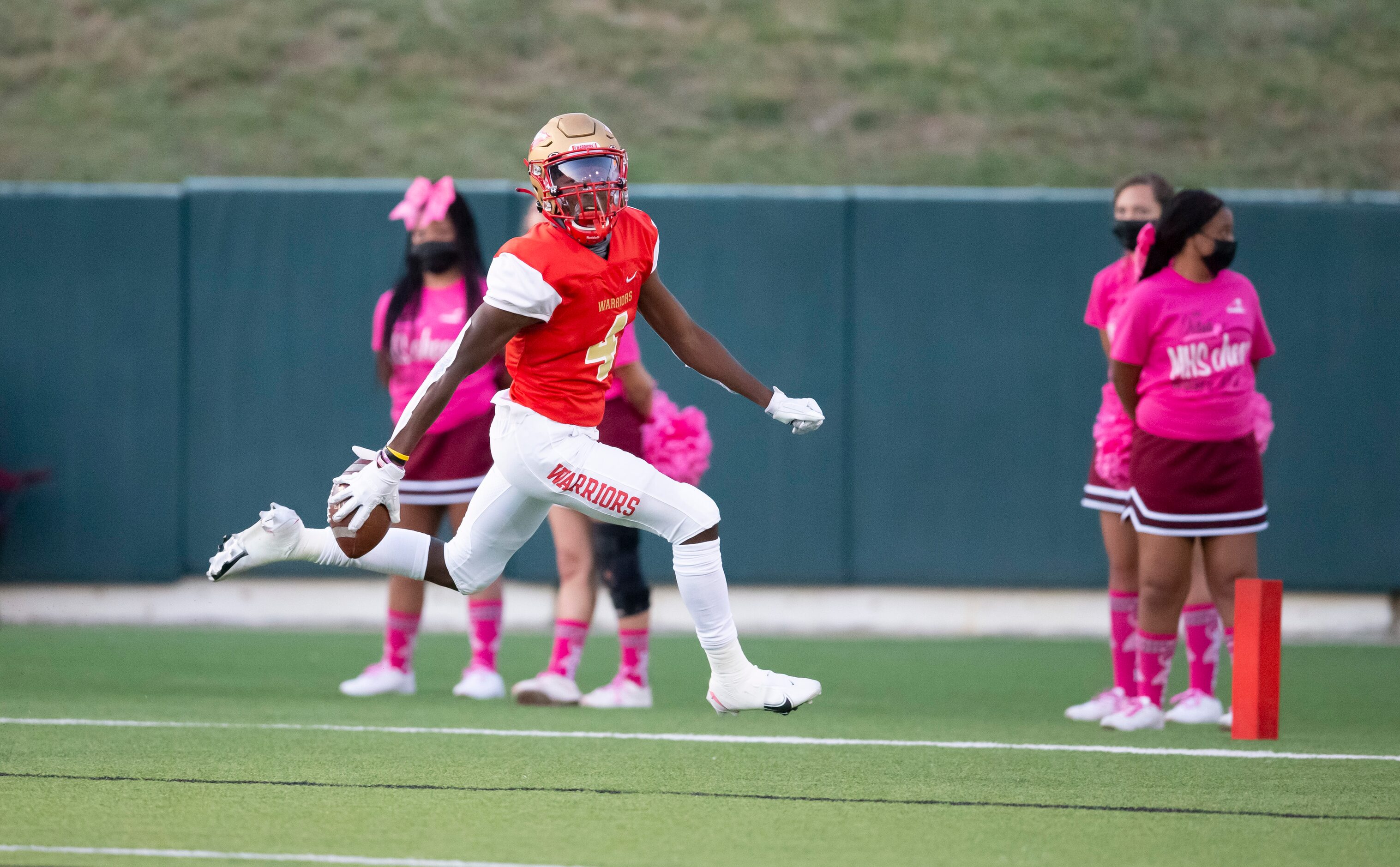 South Grand Prairie senior wide receiver Josh Nicholson (4) celebrates scoring a touchdown...