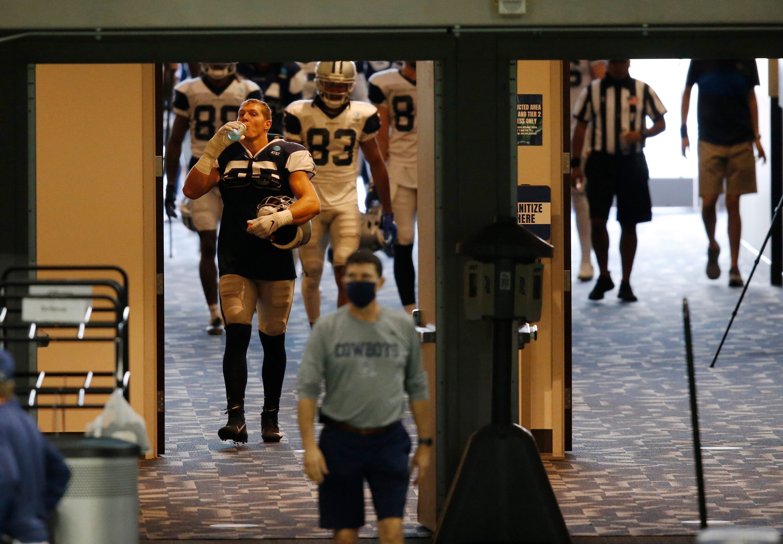 Dallas Cowboys linebacker Leighton Vander Esch (55) makes his way to the field before...