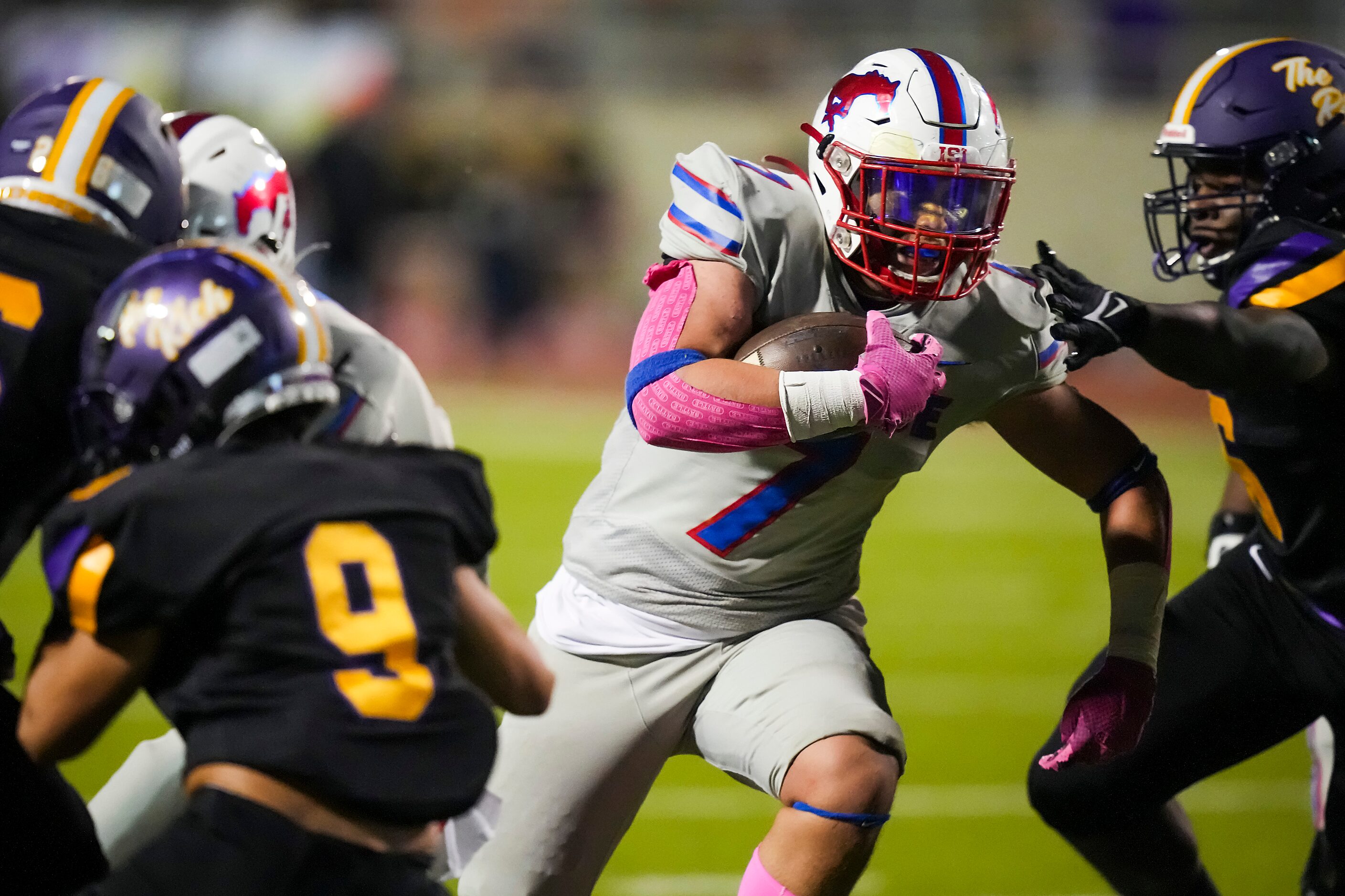 Richardson Pearce running back Christian Baker (7) breaks through the Richardson defense on...