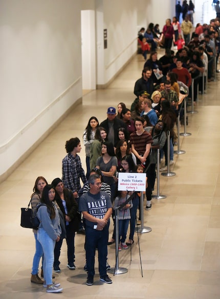 People wait in line for the "Mexico 1900-1950: Diego Rivera, Frida Kahlo, Jose Clemente...