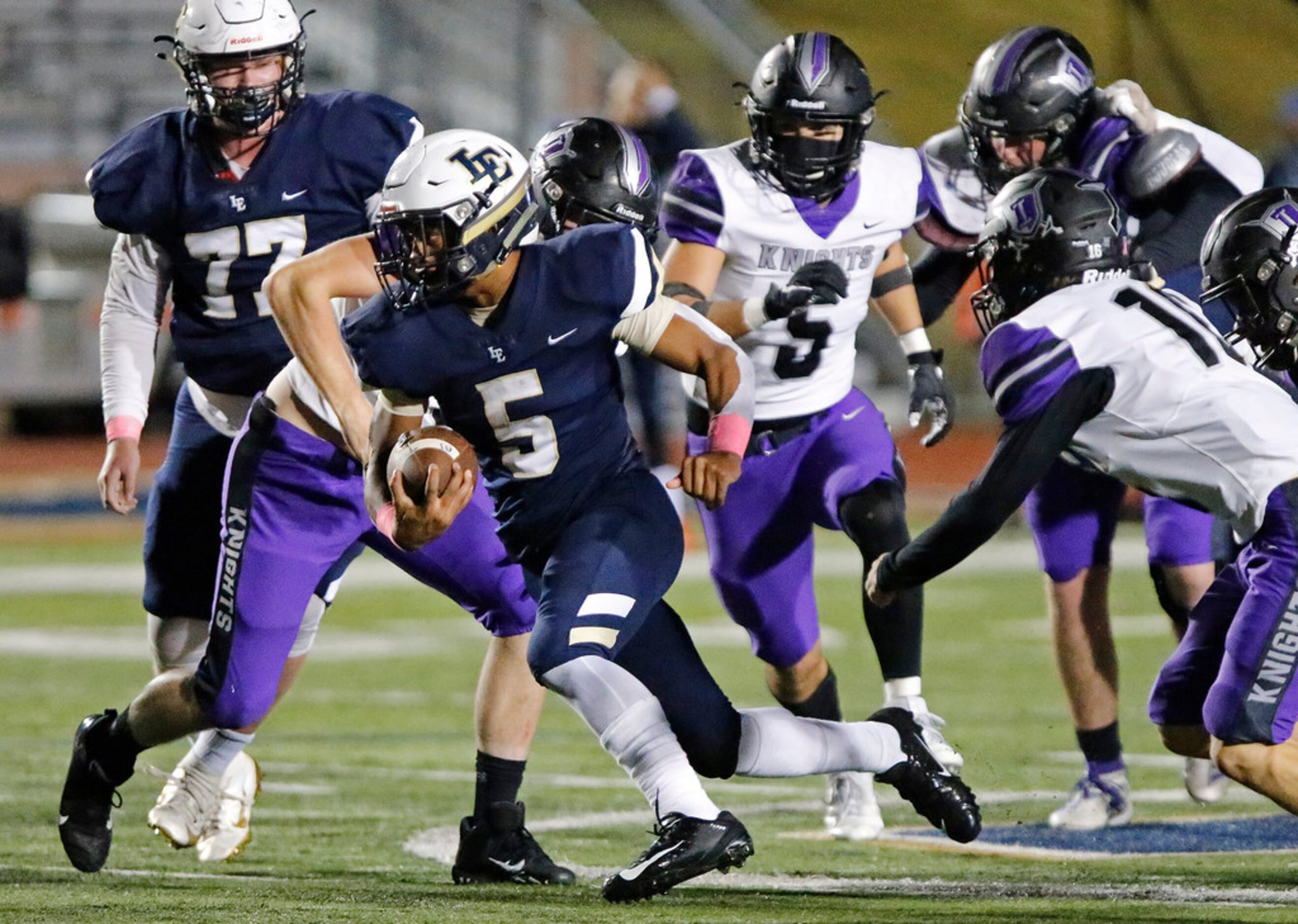 Little Elm High School running back Jason Jackson (5) runs for big yardage during the first...