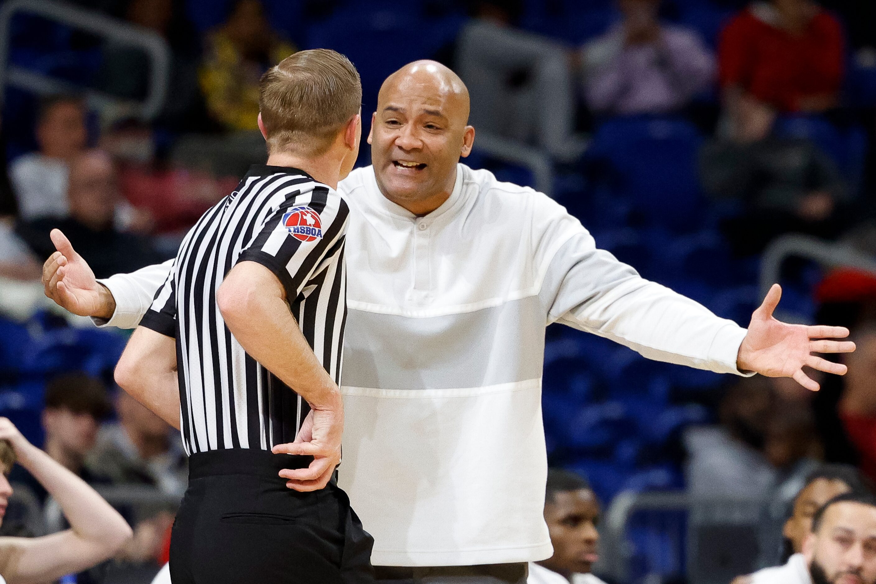 Duncanville head coach David Peavy argues for a foul call during the second quarter of a...