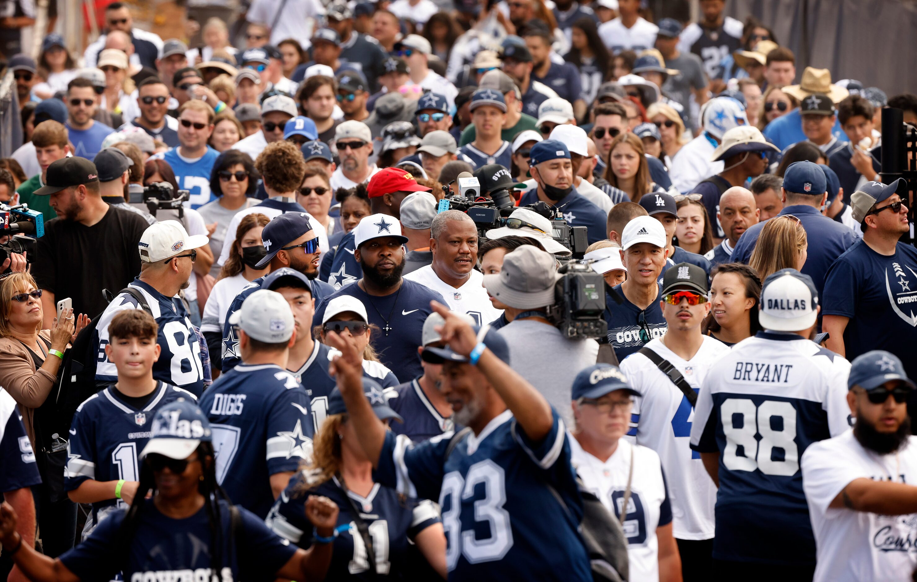 A sea of Dallas Cowboys fans flood the midway as after the gates were opened for Cowboys...