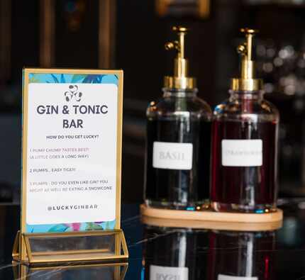 Customers can follow directions for pumping flavor into gin and tonics at ˈLəkē — or ask a...