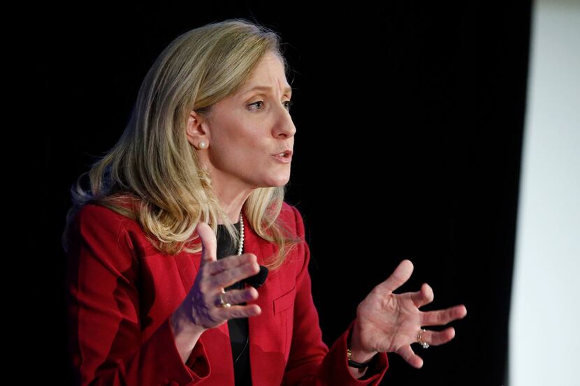 Abigail Spanberger gestures during a debate with Rep. Dave Brat, R-Va., at Germanna...