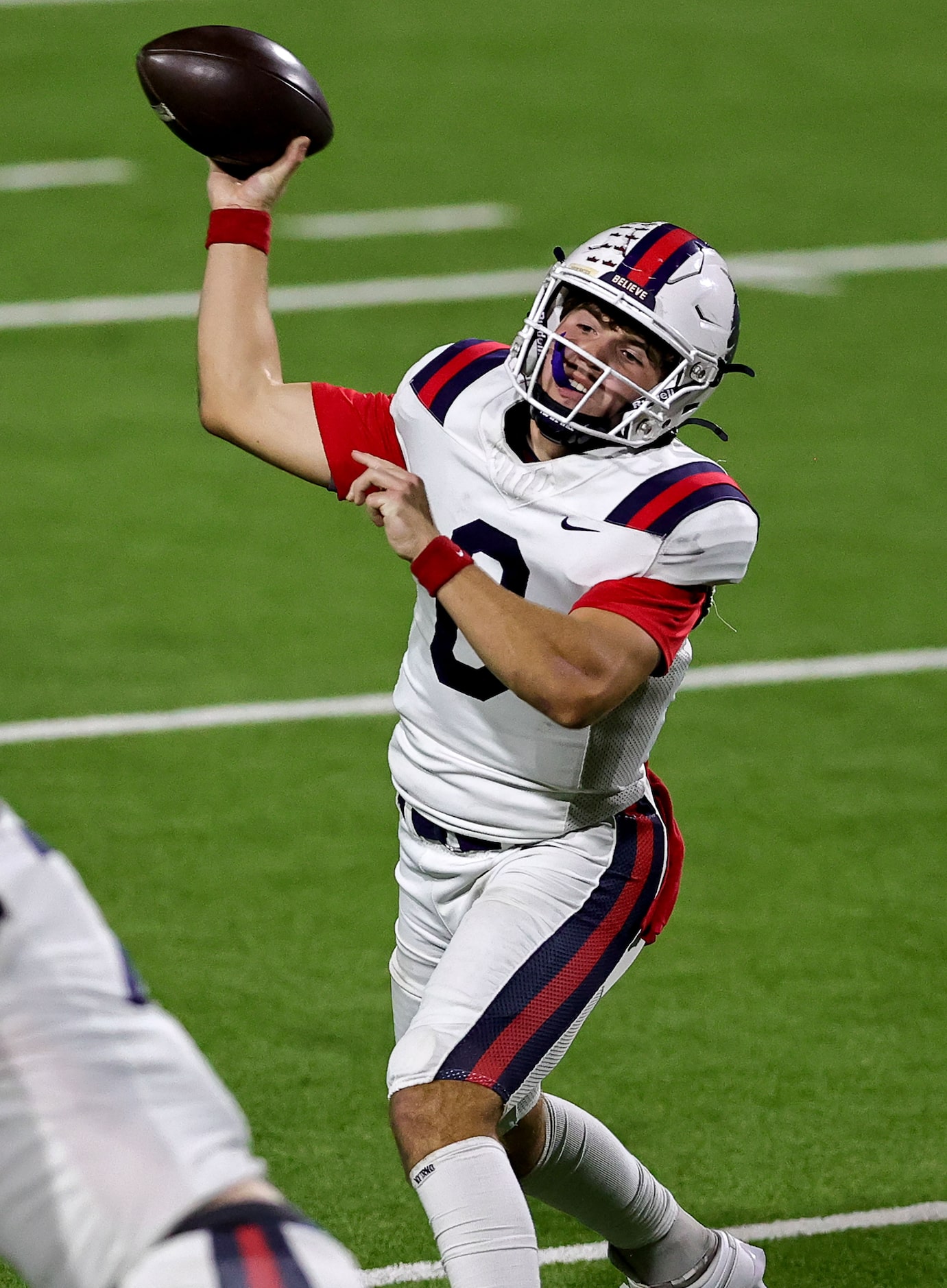 Richland quarterback Drew Kates attempts a pass against Denton Ryan during the first half of...