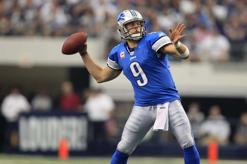 Detroit Lions quarterback Matthew Stafford (9) throws for a touchdown in the second half of...