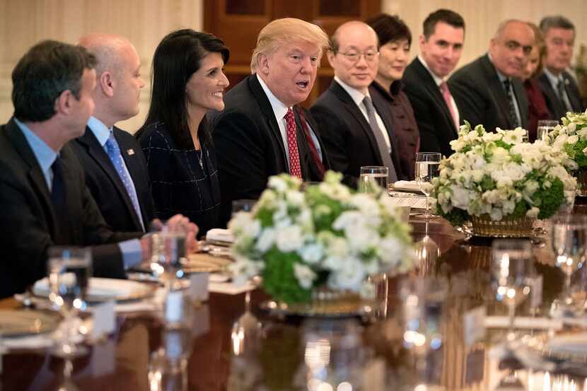 WASHINGTON, DC - APRIL 24:  U.S. President Donald Trump (C) delivers remarks while hosting...