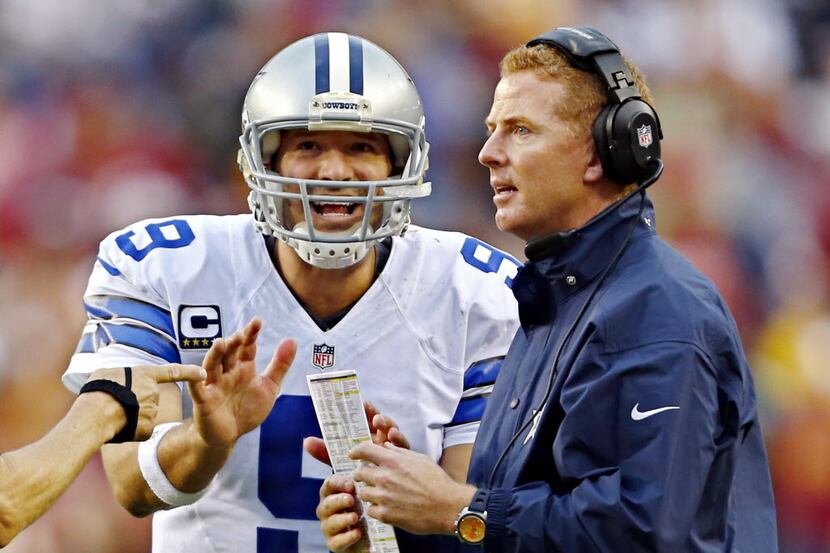 Dallas Cowboys quarterback Tony Romo (9) pleads with head coach Jason Garrett during the...