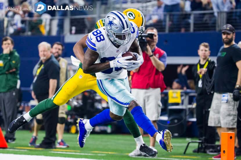 Dallas Cowboys wide receiver Dez Bryant (88) crosses the goal line for a touchdown while...