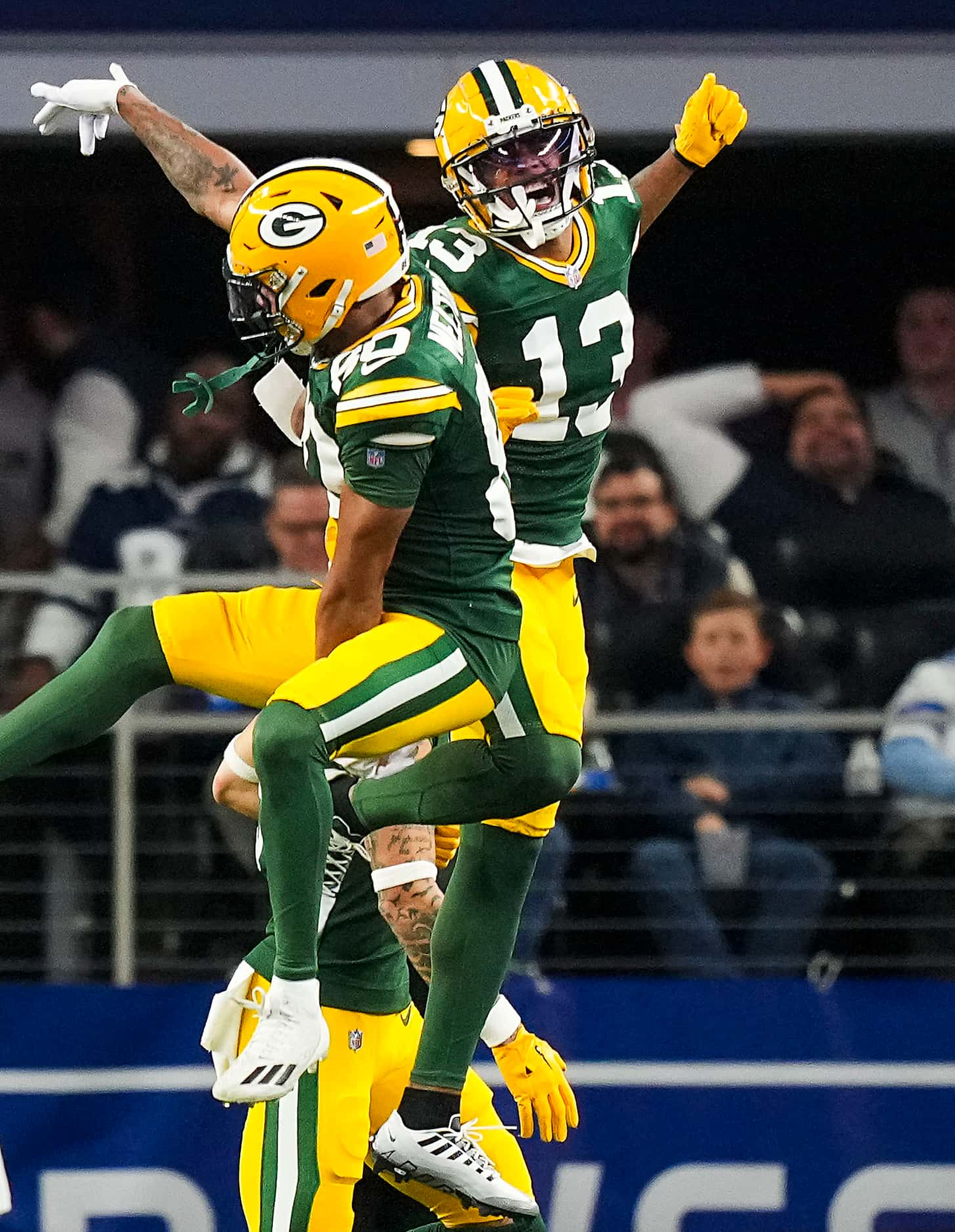 Green Bay Packers wide receiver Dontayvion Wicks (13) celebrates after catching a touchdown ...