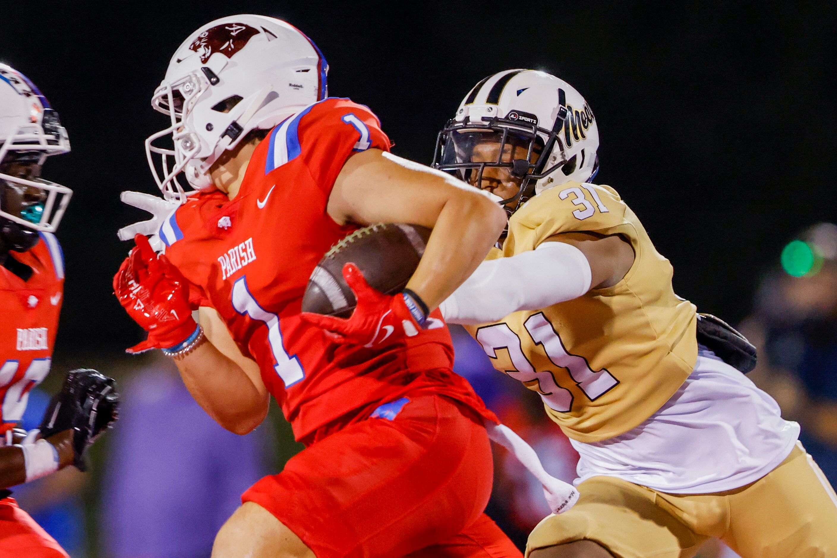 Parish Episcopal’s wide receiver Derek Eusebio (1) runs from South Oak Cliff’s line backer...