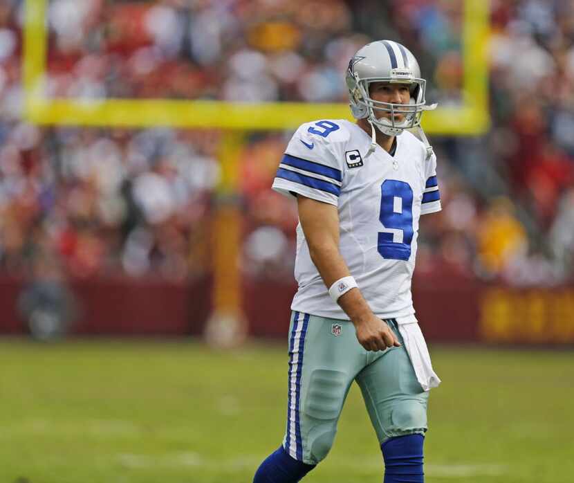 Dallas Cowboys quarterback Tony Romo (9) walks  onto the field during the last drive of the ...