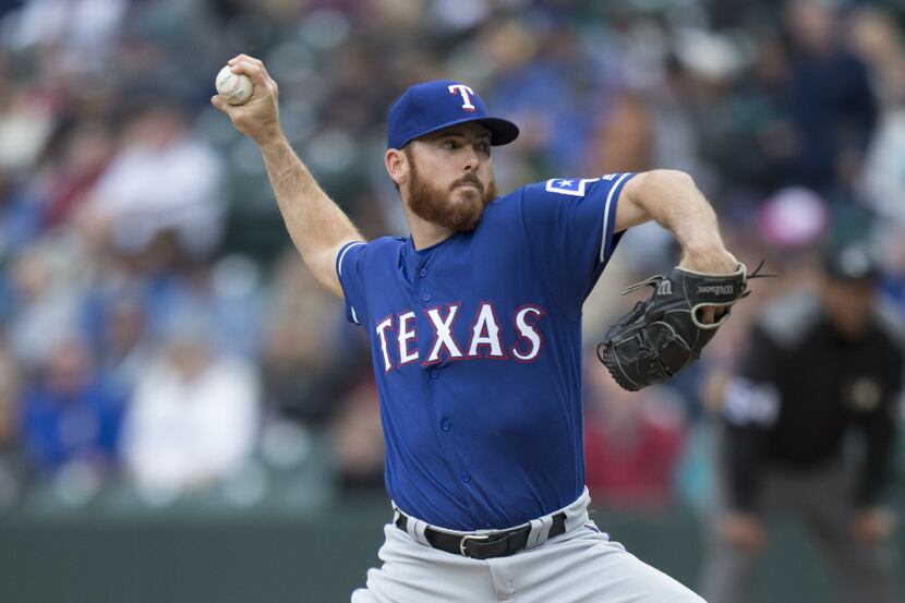 SEATTLE, WA - APRIL 16: Reliever Sam Dyson #47 of the Texas Rangers delivers a pitch during...