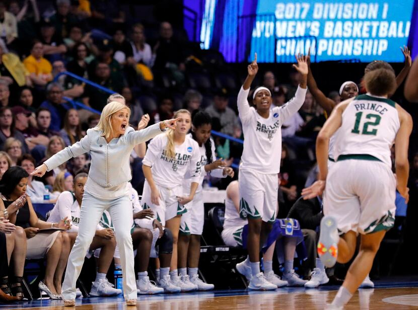 Baylor head coach Kim Mulkey, left, directs her team during the first half of a regional...