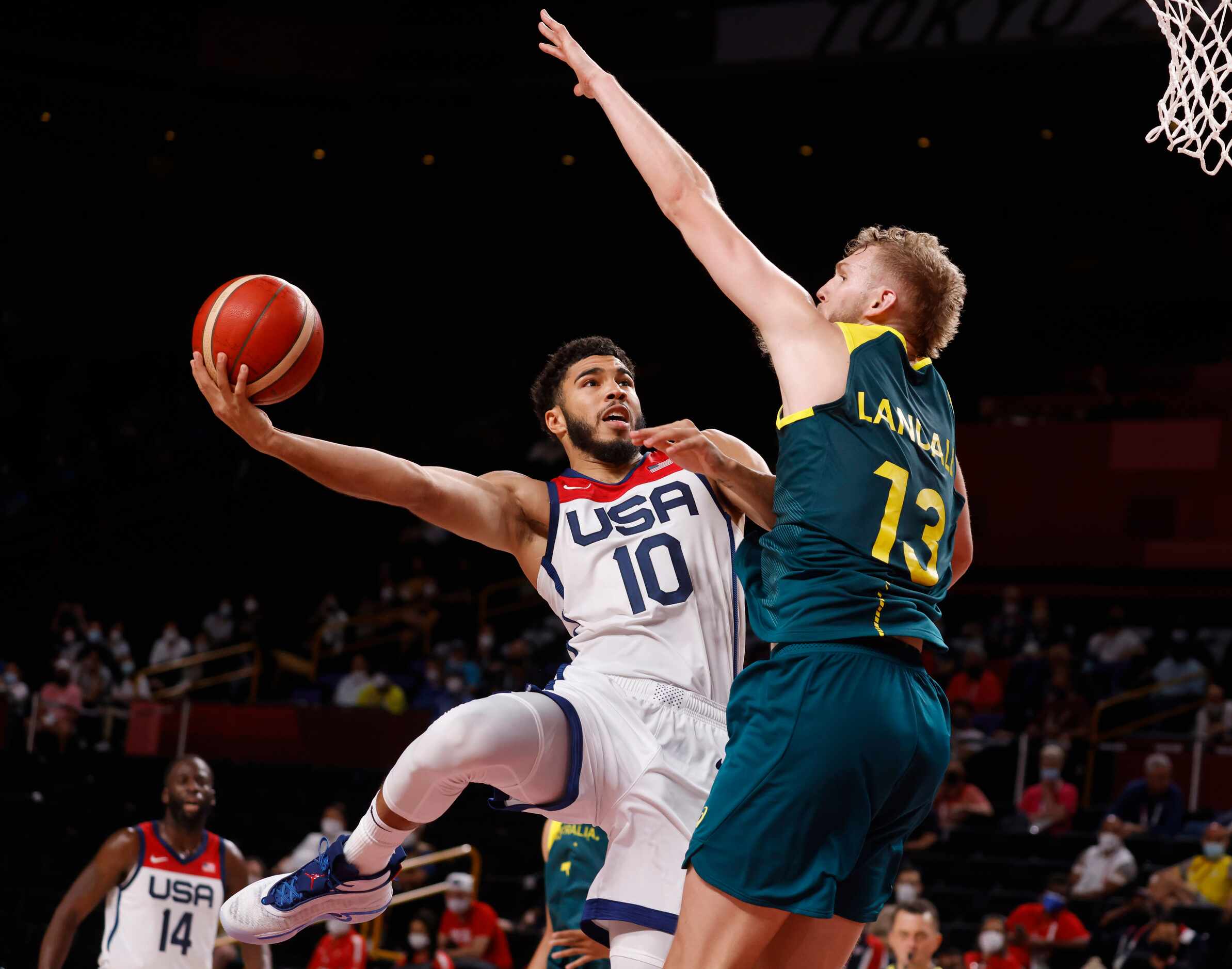 USA’s Jayson Tatum (10) attempts to shoot over Australia’s Jock Landale (13) during the...