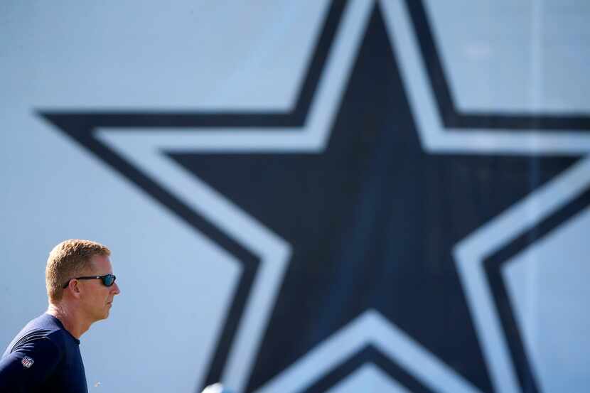 Cowboys head coach Jason Garrett watches his players during an afternoon practice at...